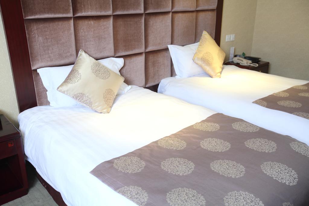 Qingdao Sanfod Hotel Номер фото
