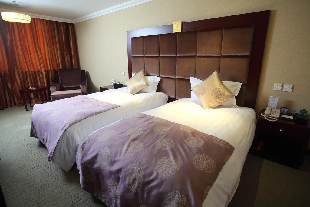 Qingdao Sanfod Hotel Номер фото