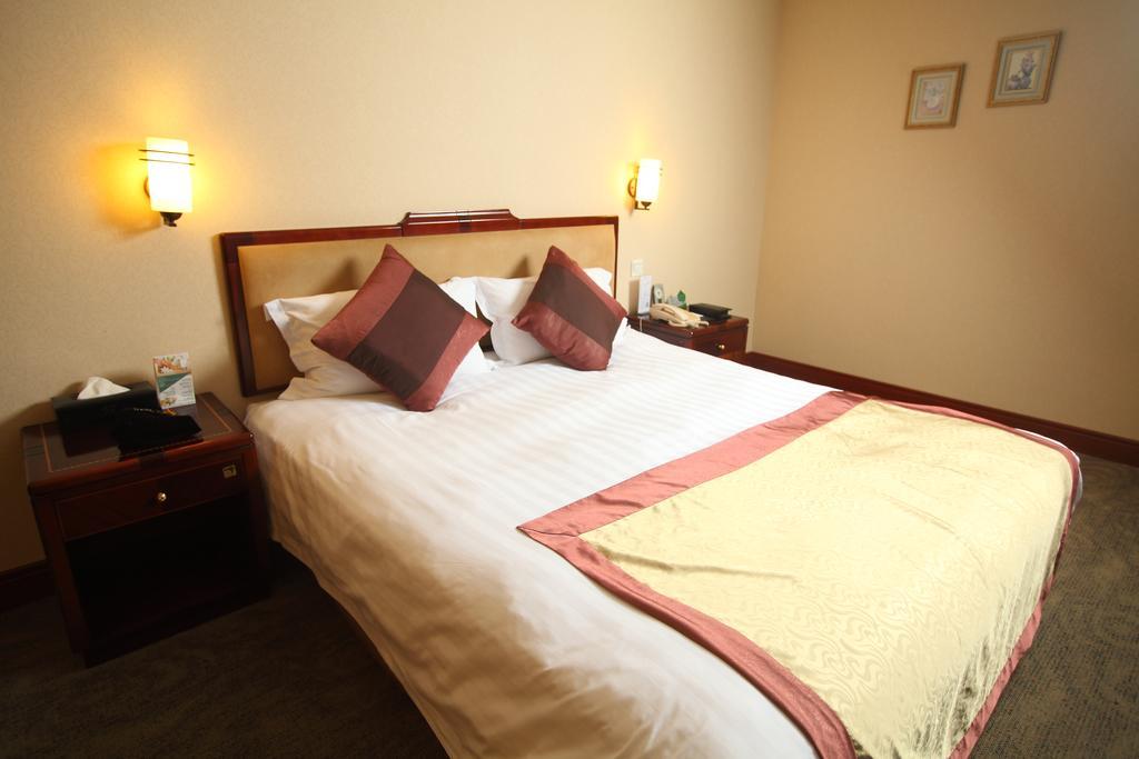 Qingdao Sanfod Hotel Номер фото
